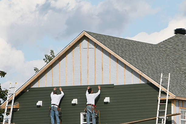Professional Siding Replacement technician working in Rock Creek, OH